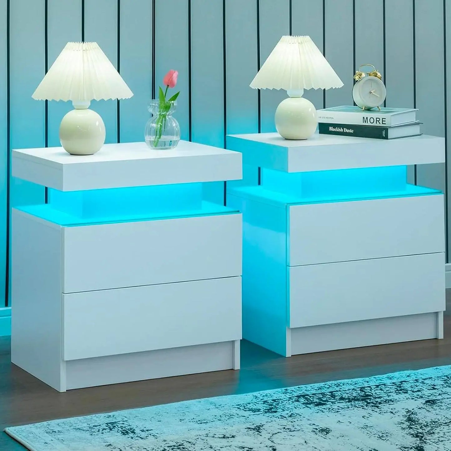 Set of 2 Nightstands with 2 Drawers and LED Light White. The built-in RGB LED strip light system has multi-color lights, 29 dynamic light modes,  a music sync mode, and a timer. The light brightness also can be adjusted.